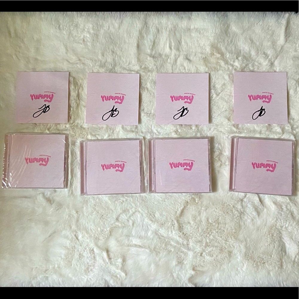 Justin Bieber autographed CD’S